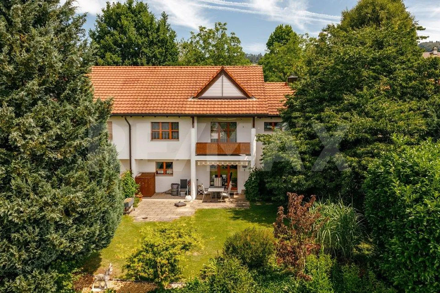 Privileged Living with Garden Paradise in Sunny and Scenic Location - Photo 1 of 13