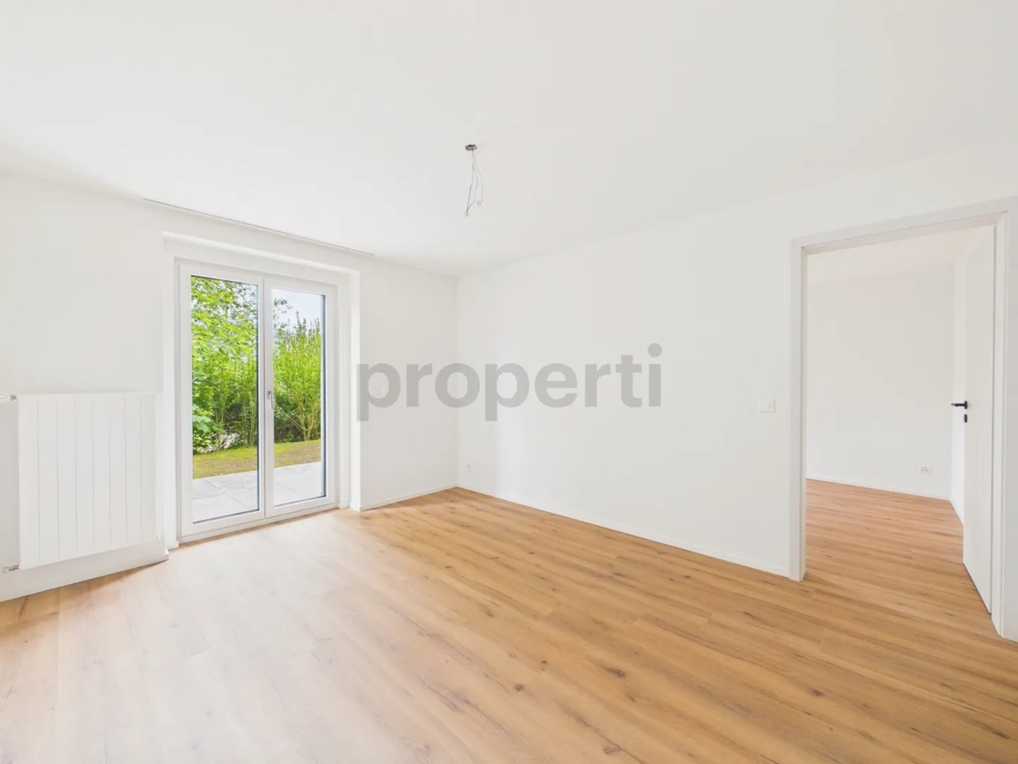 Geräumige Wohnung mit Garten - Foto 6 von 8