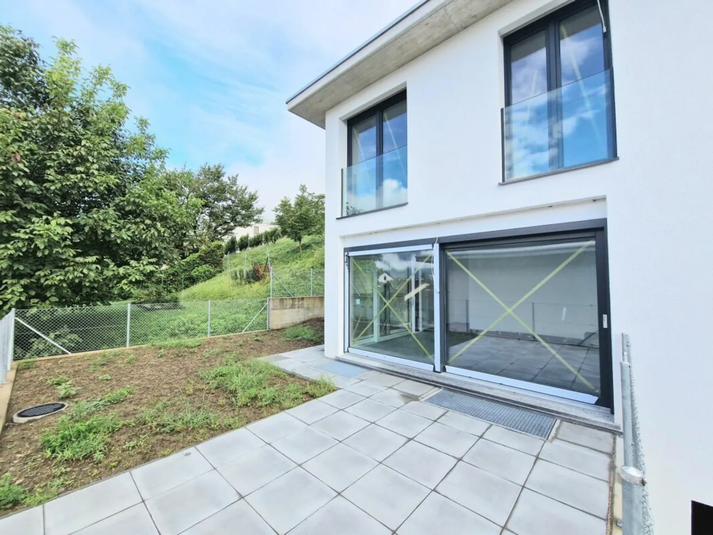 Neues Einfamilienhaus mit Garten - Foto 1 von 25