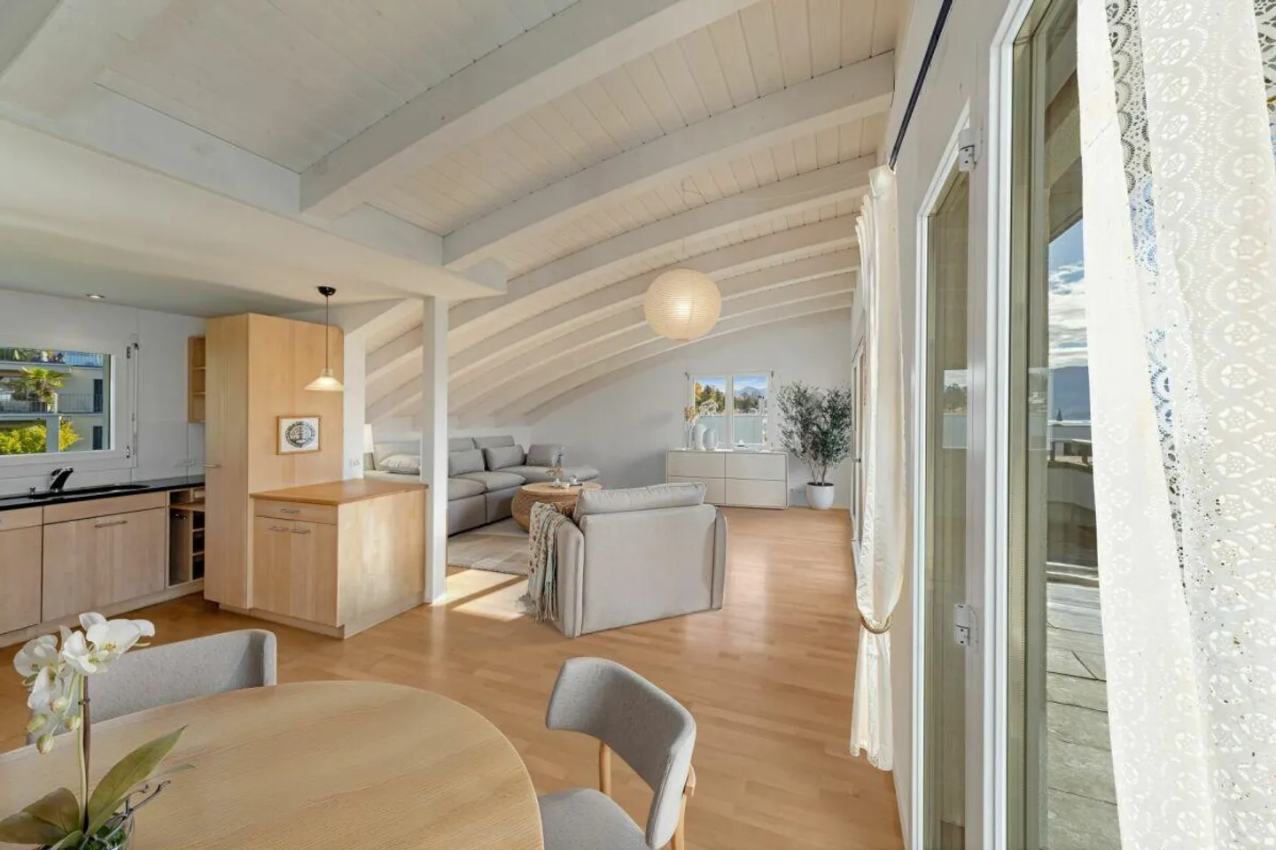 Sunny penthouse gem with partial lake view - Photo 2 of 5