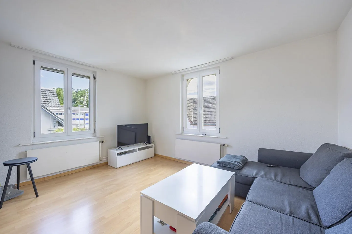 Maison multifamiliale compacte avec 3 appartements - Photo 4 sur 13