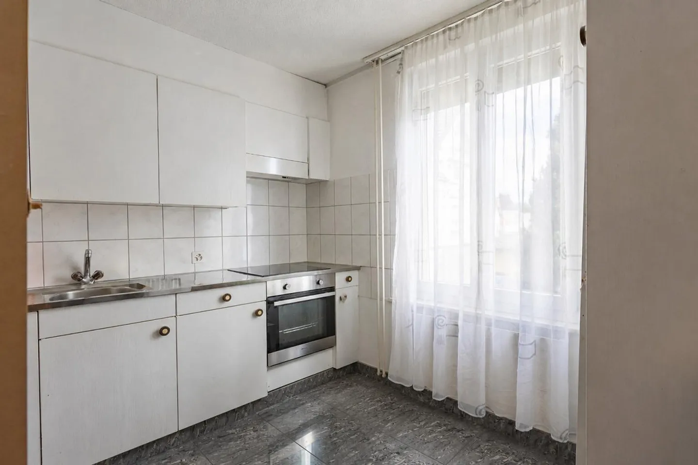 Maison multifamiliale compacte avec 3 appartements - Photo 7 sur 13