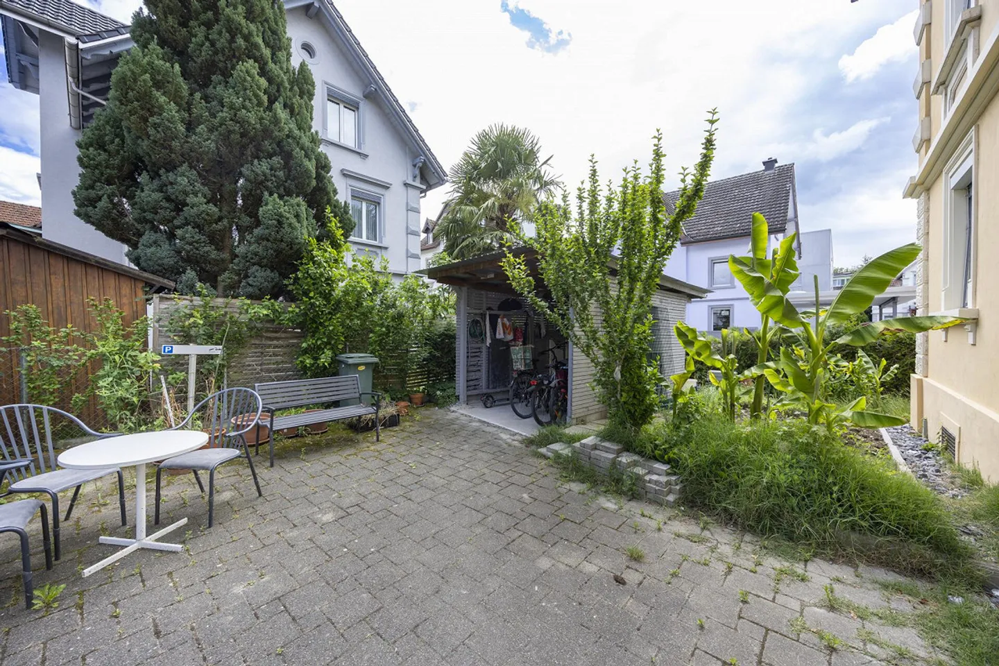 Maison multifamiliale compacte avec 3 appartements - Photo 12 sur 13