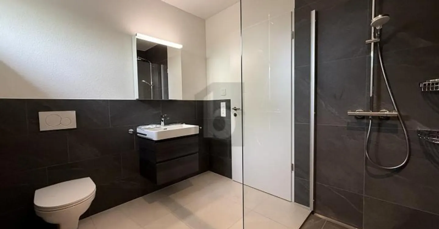 Appartement ensoleillé avec jardin - Photo 2 sur 6