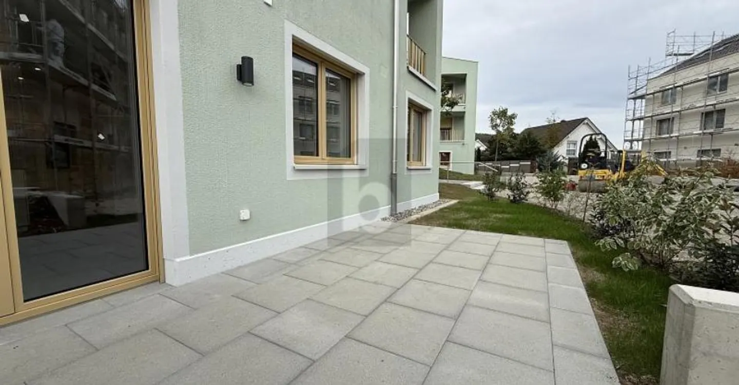 Appartement ensoleillé avec jardin - Photo 4 sur 6