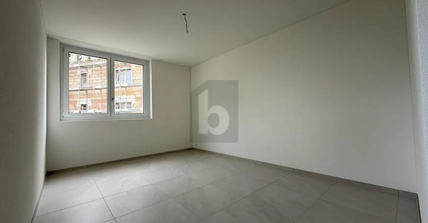 Appartement ensoleillé avec jardin - Photo 3 sur 6