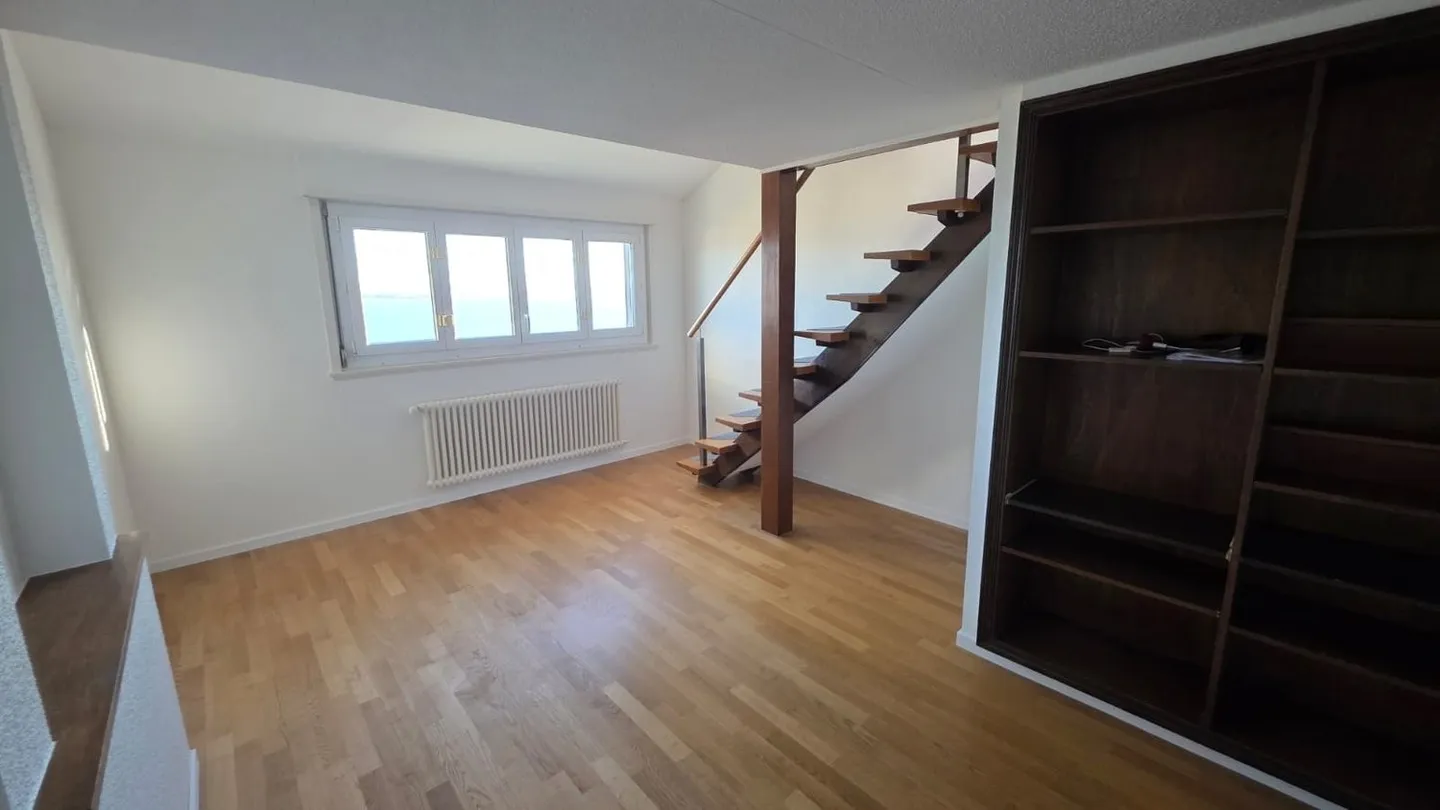 MAGNIFIQUE LOGEMENT AVEC SUPERBE VUE SUR LE LAC - Photo 4 sur 10