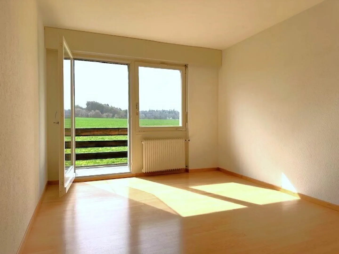 BRIGHT AND SPACIOUS WITH BALCONY IN THE GREEN - Photo 2 of 6