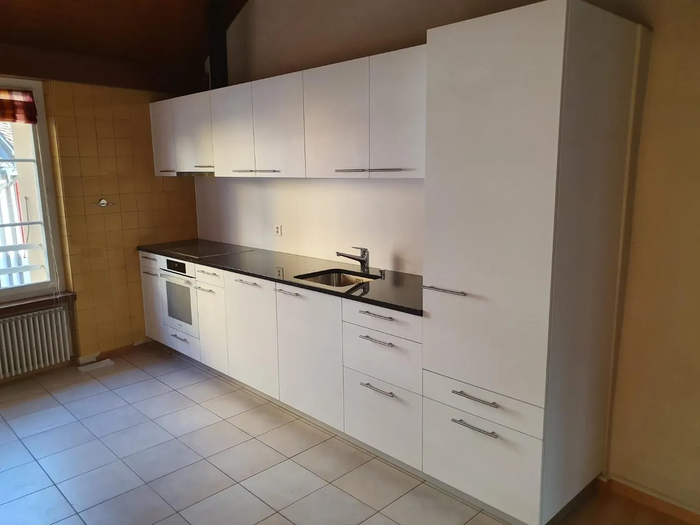 Appartamento con 4.5 stanze in mansarda - Foto 1 di 11