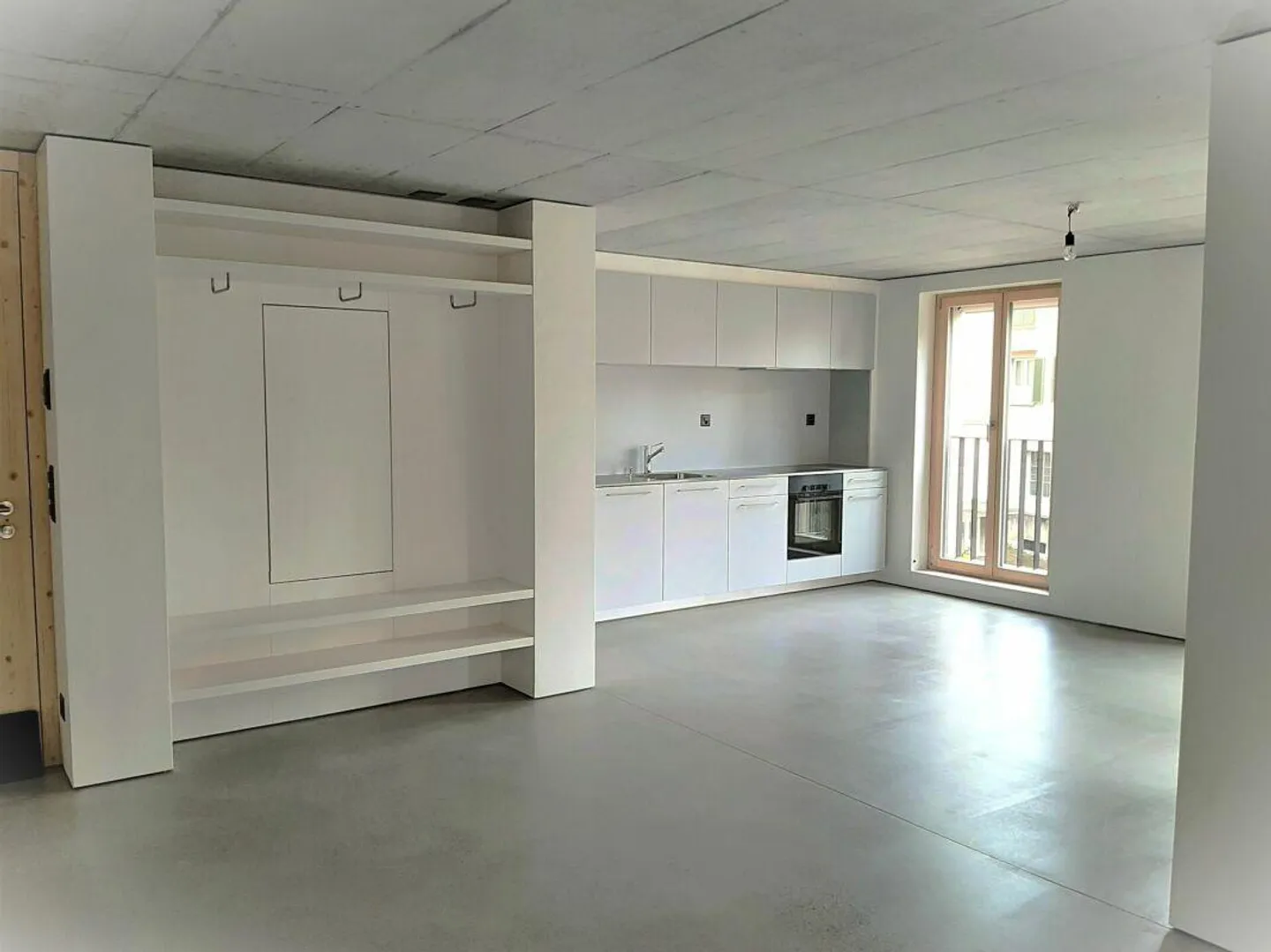 Appartement moderne de 2,5 pièces au centre du village - Photo 4 sur 8