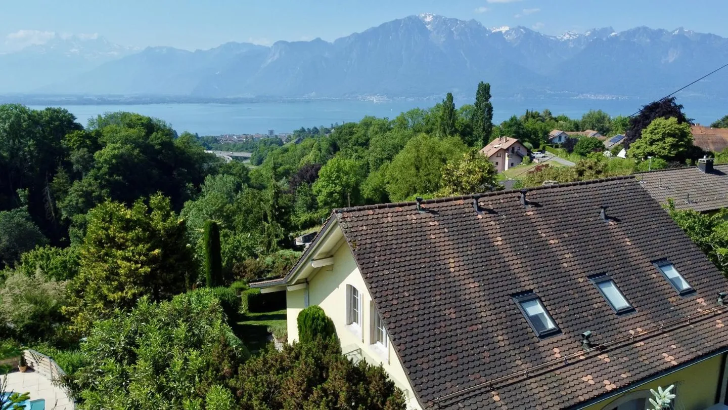Maison dans un endroit calme avec jardin et vue sur le lac - Photo 1 sur 13