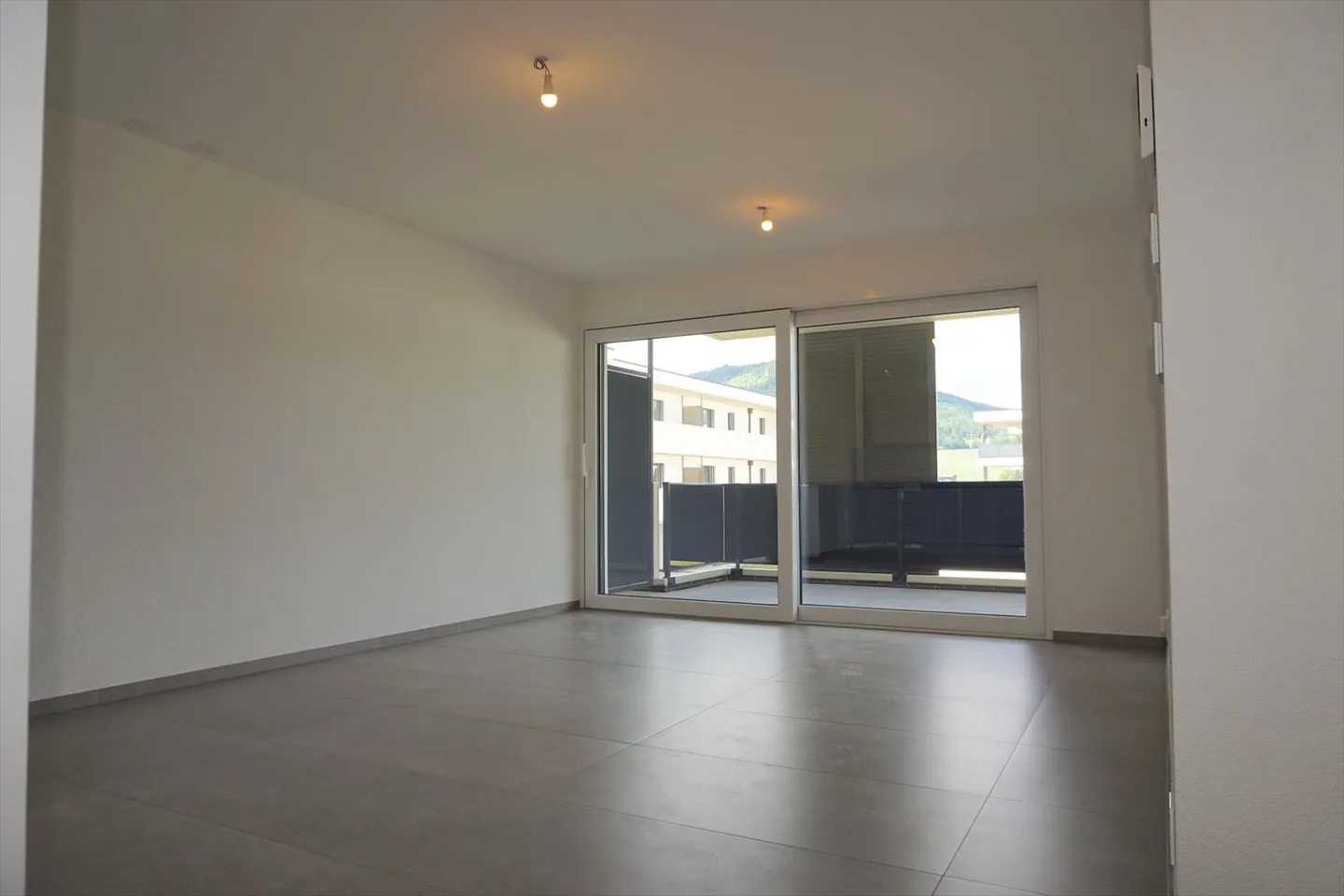 Appartamento di 3,5 locali - Superficie netta di 74 m2 - Terrazza di 19 m2 - esposto a ovest - Foto 3 di 13