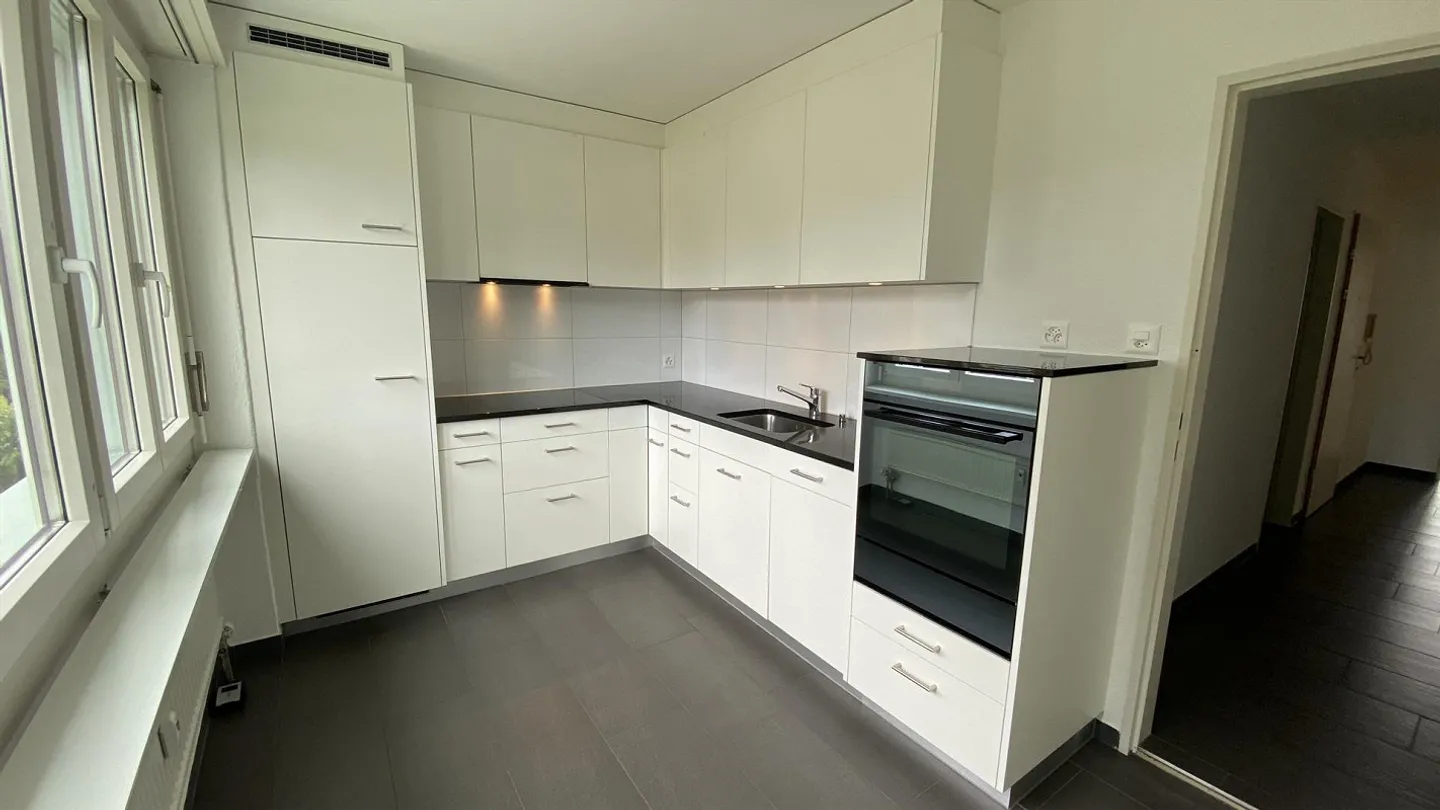 Modernes Apartment mit Balkon - Foto 1 von 13