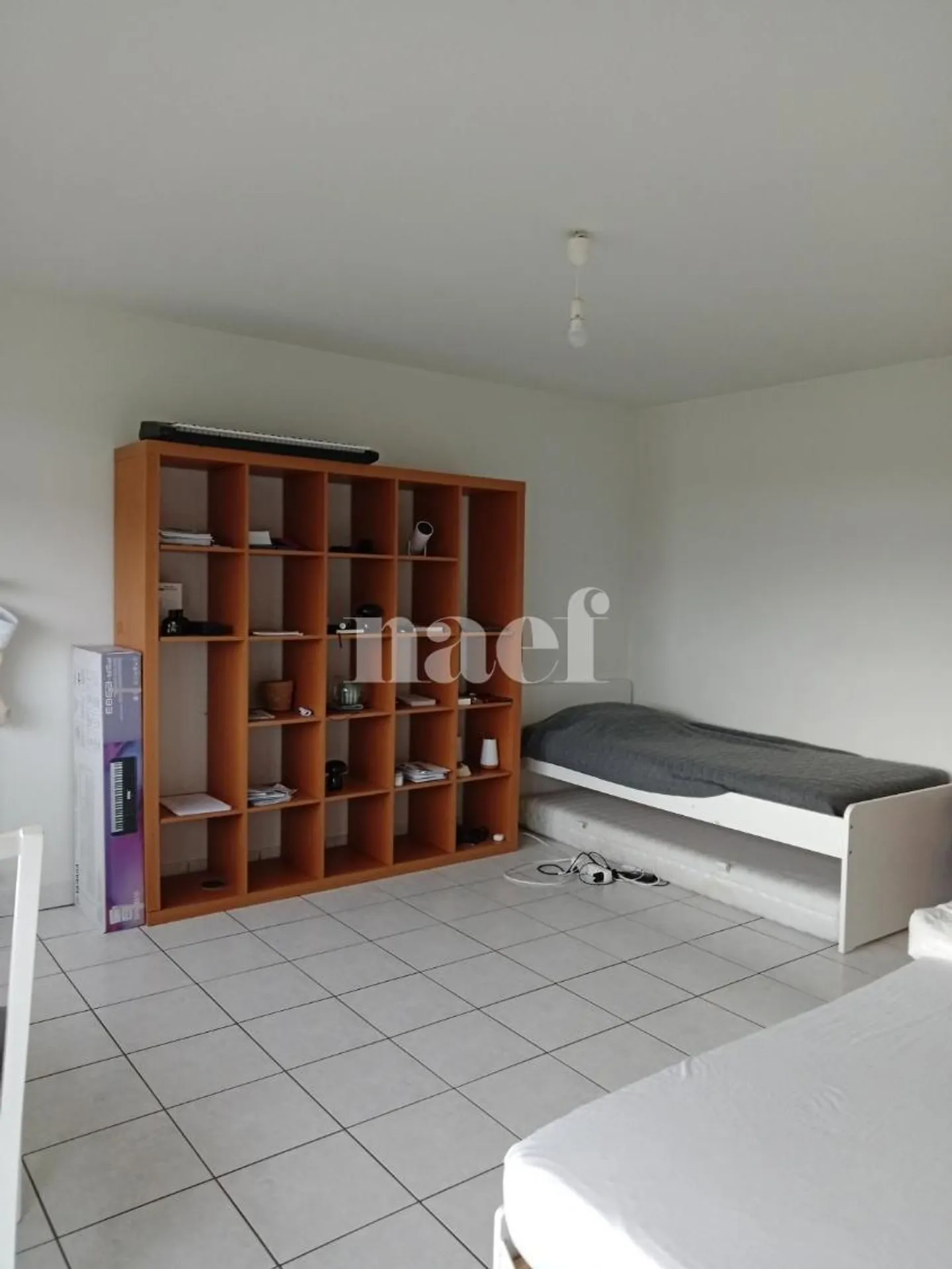 Appartement Charmant avec Balcon - Photo 2 sur 4