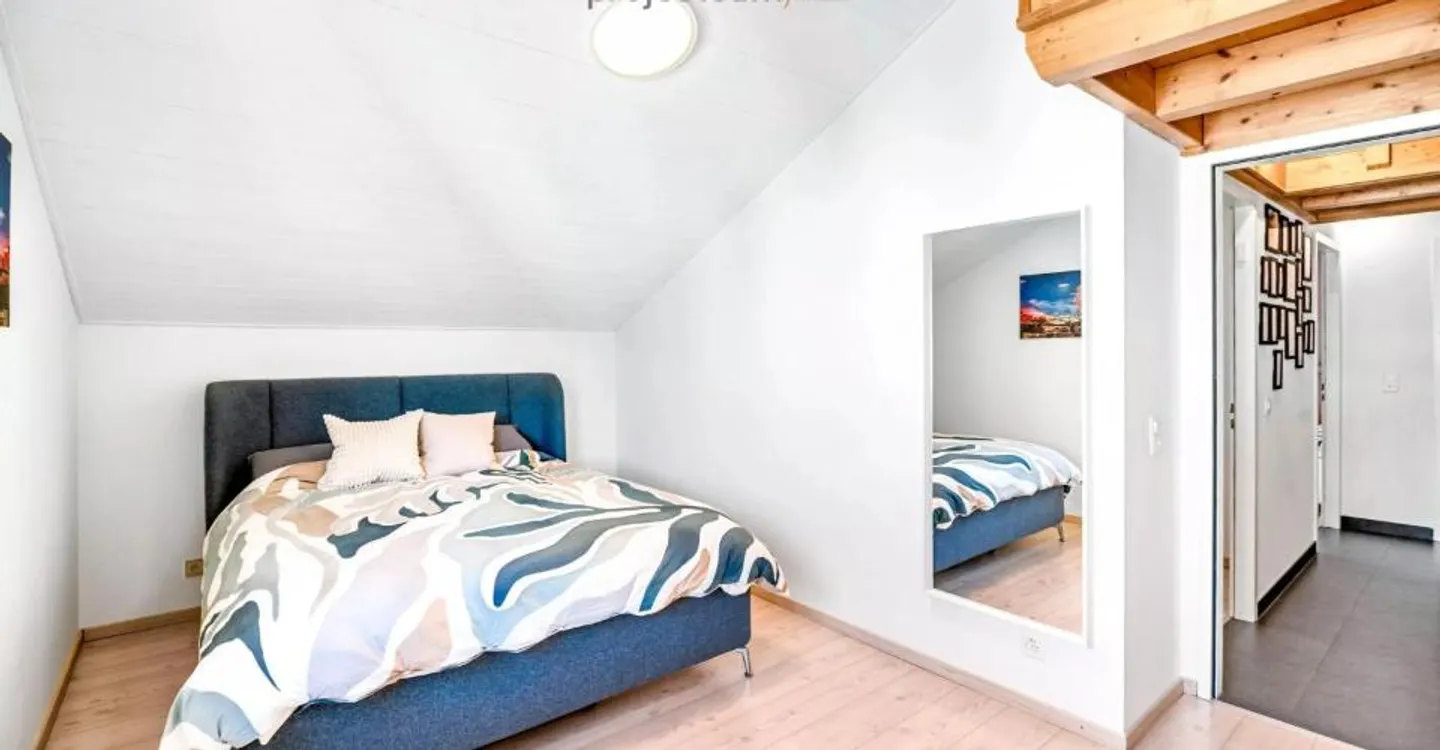 Duplex charmant en attique - Photo 10 sur 10