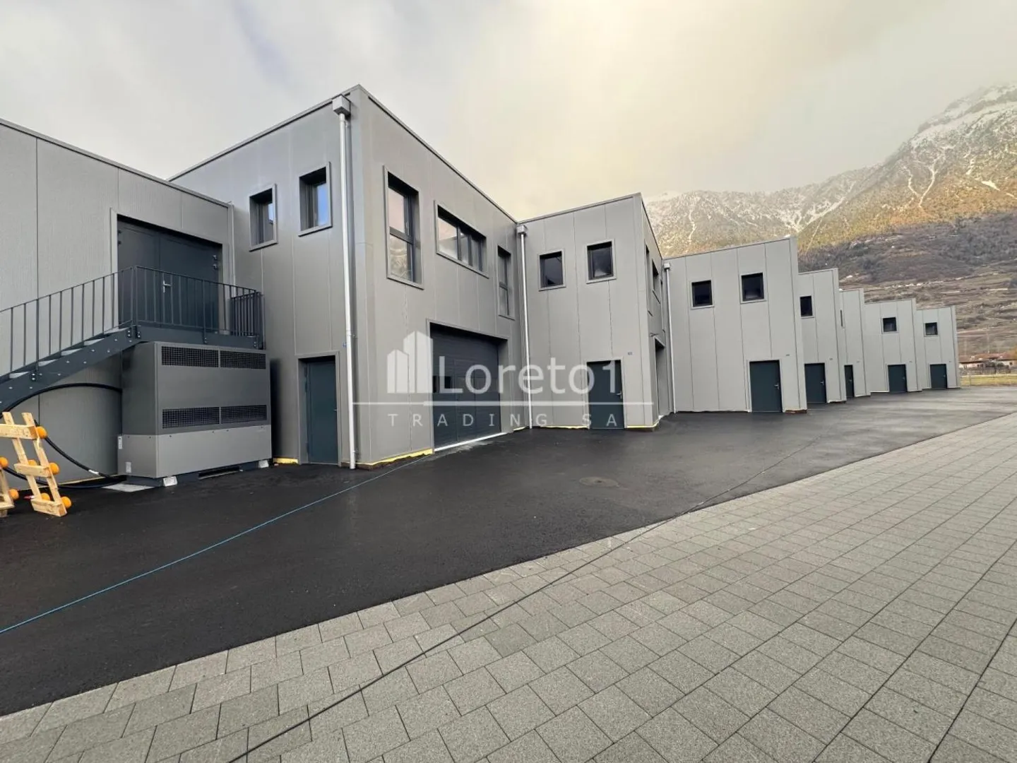 Places de parc extérieures à Fully - Photo 1 sur 4