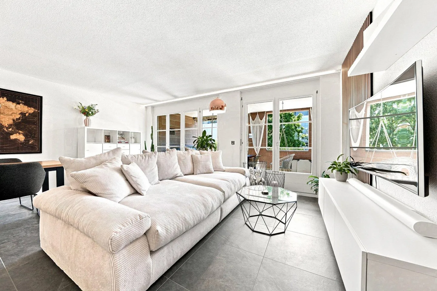 Stylish living with large balcony - Photo 1 of 10