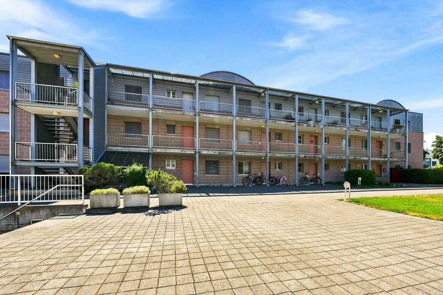 Stylish living with large balcony - Photo 9 of 10
