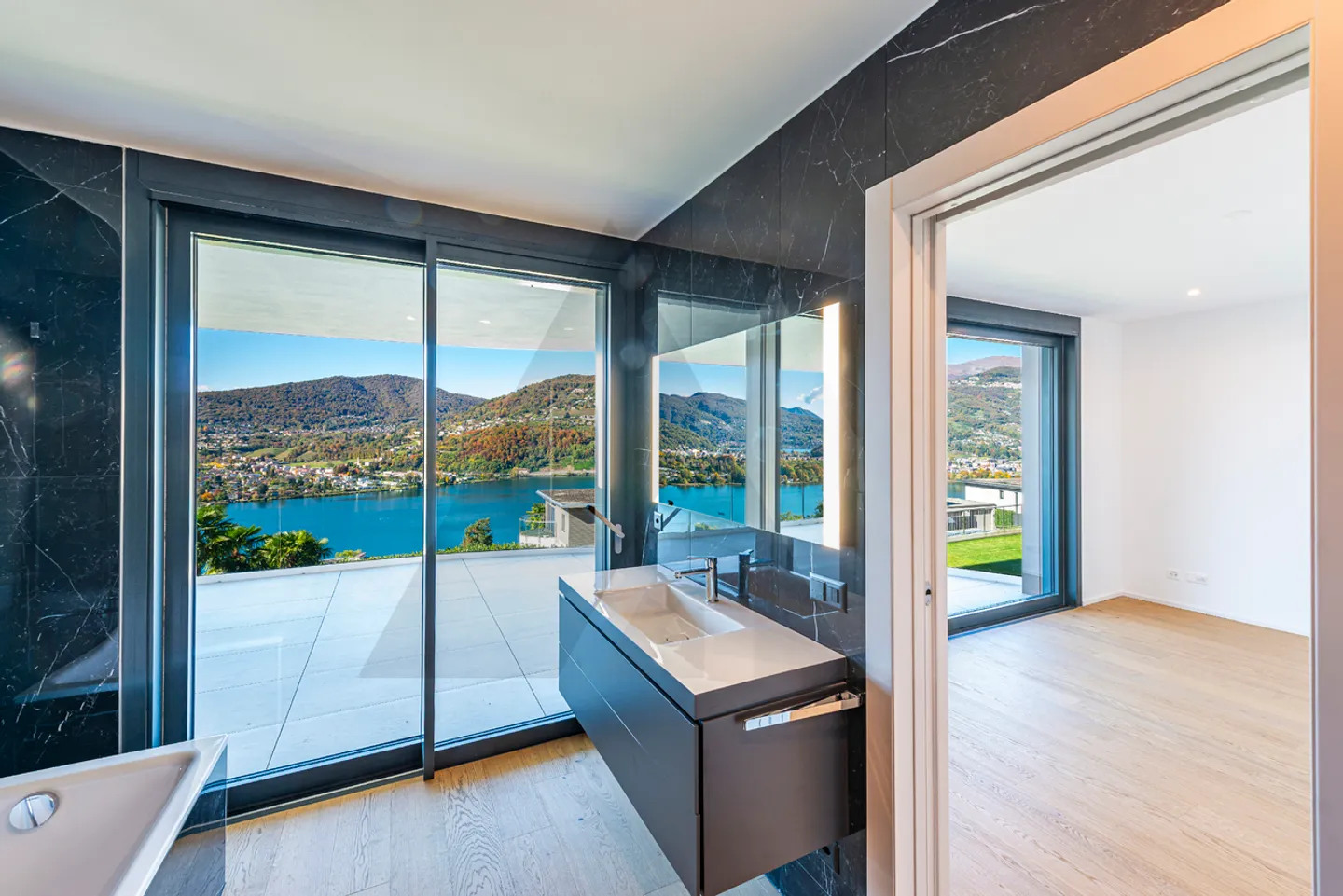 APPARTEMENT ÉLÉGANT AVEC VUE SUR LE LAC À MONTAGNOLA - Photo 4 sur 14