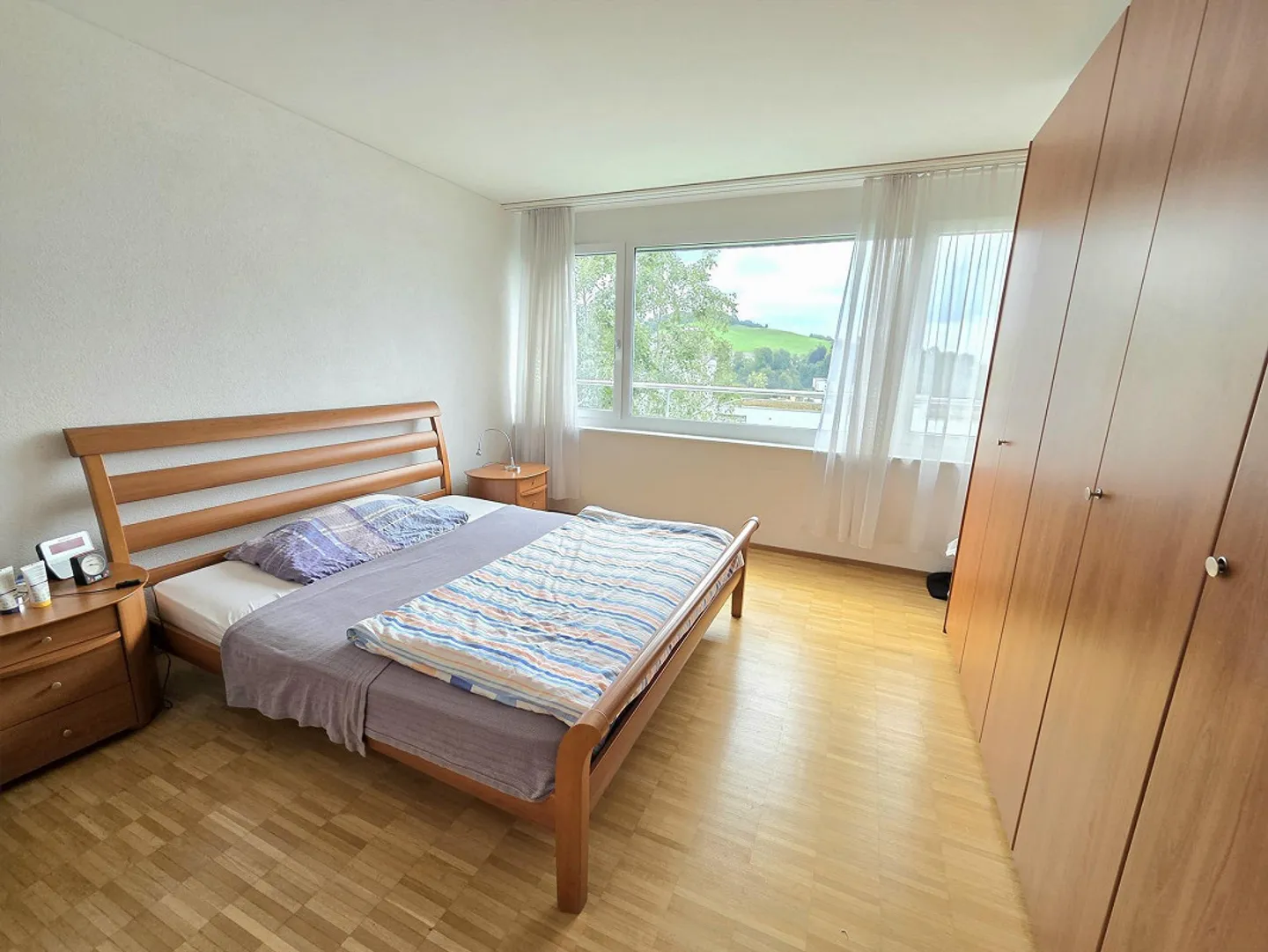 Appartement lumineux avec vue lointaine - Photo 7 sur 12