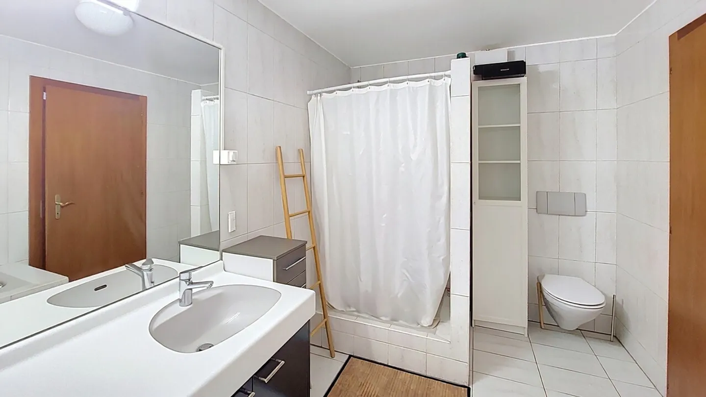Appartement au rez-de-chaussée - Photo 9 sur 13