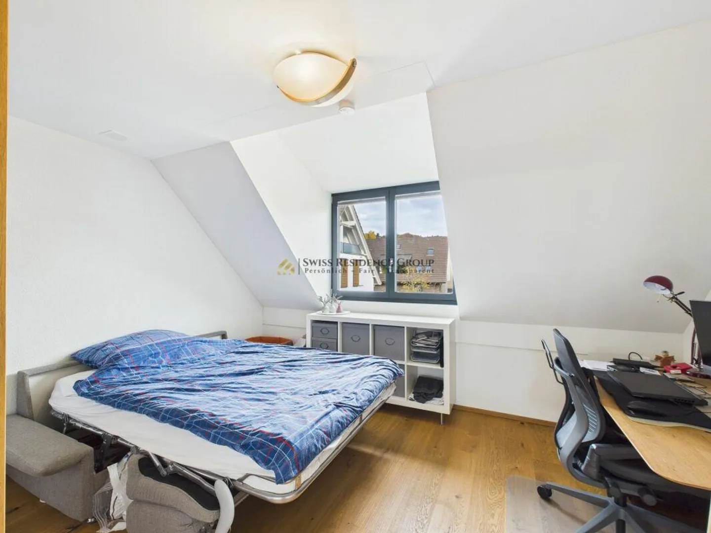 Family-friendly 4.5-room Minergie apartment with panoramic views, comfort, and attractive tax situation - Photo 12 of 16
