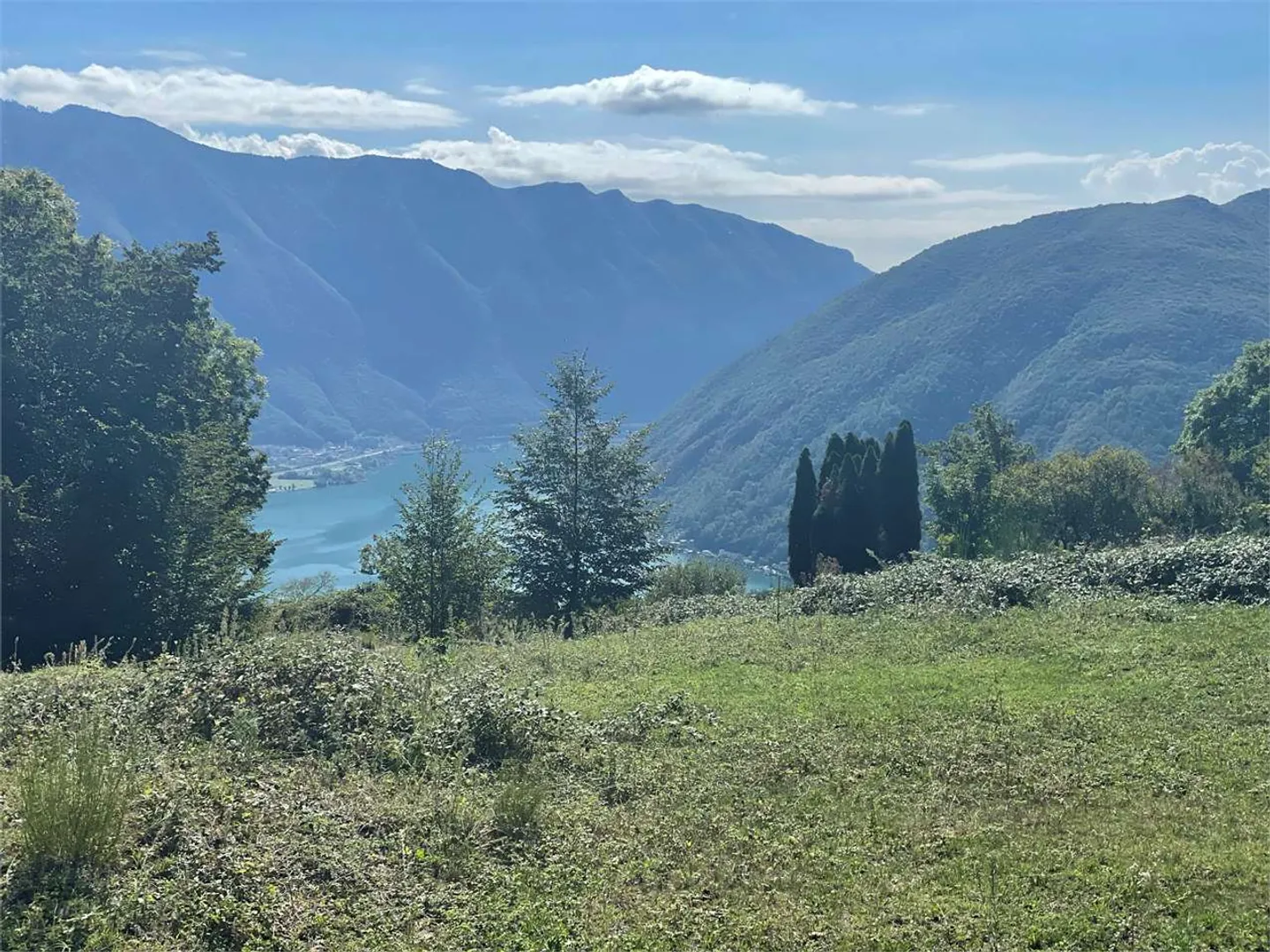 Bauland mit Seeblick in Carona - Foto 1 von 2