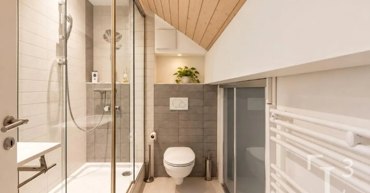 Spacieux duplex en attique avec balcon + un potager! - Photo 11 of 12