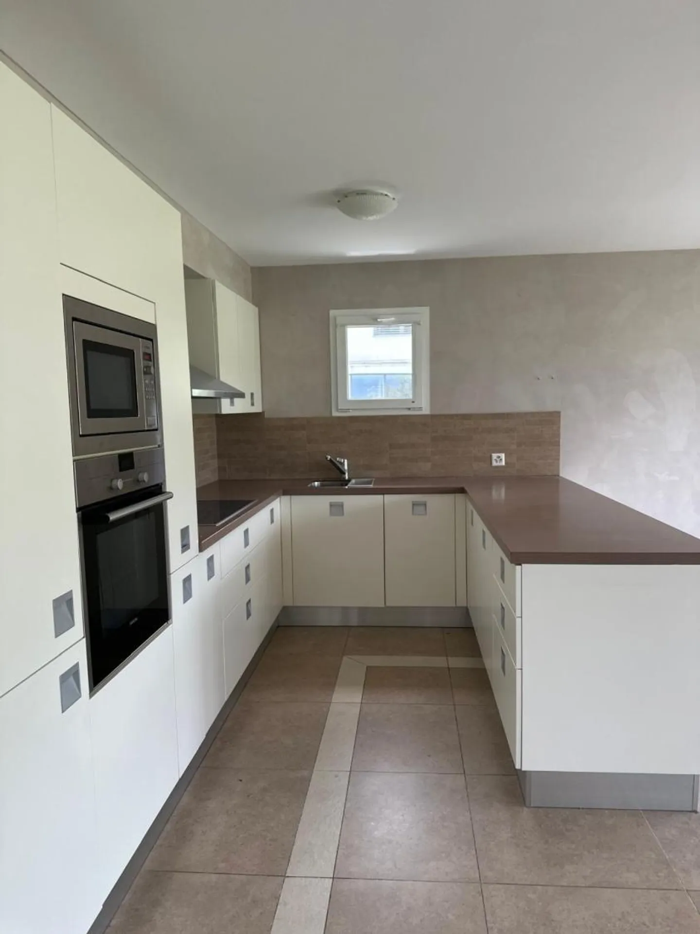 Geräumige Wohnung mit Garten - Foto 12 von 12