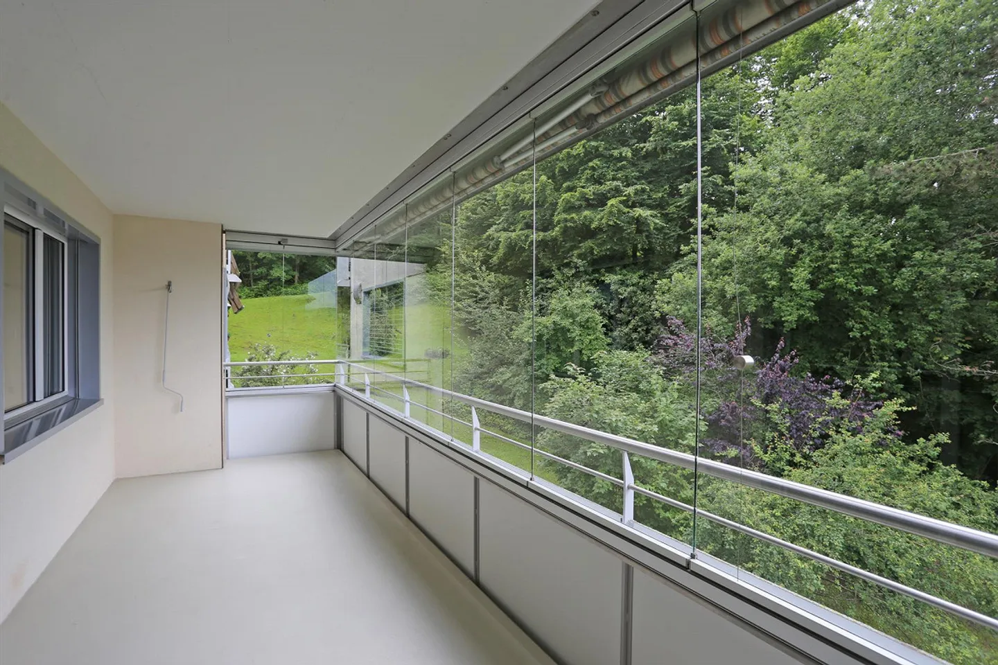 5.5-room apartment in a natural setting, in a family-friendly LS - Photo 2 of 6