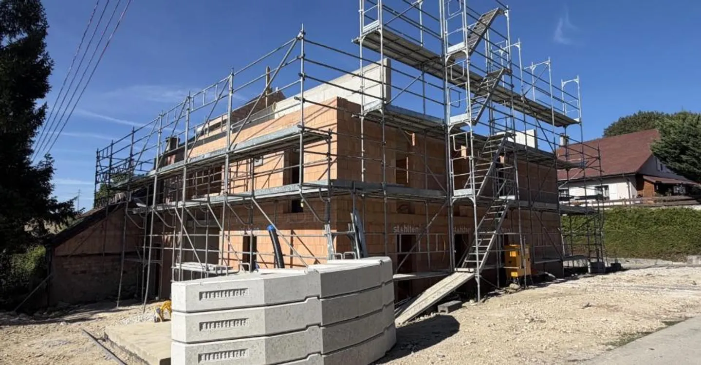 The construction is progressing! Delivery for summer 2027. Only 2 apartments available. Starting from CHF 795,000.--. - Photo 1 of 12