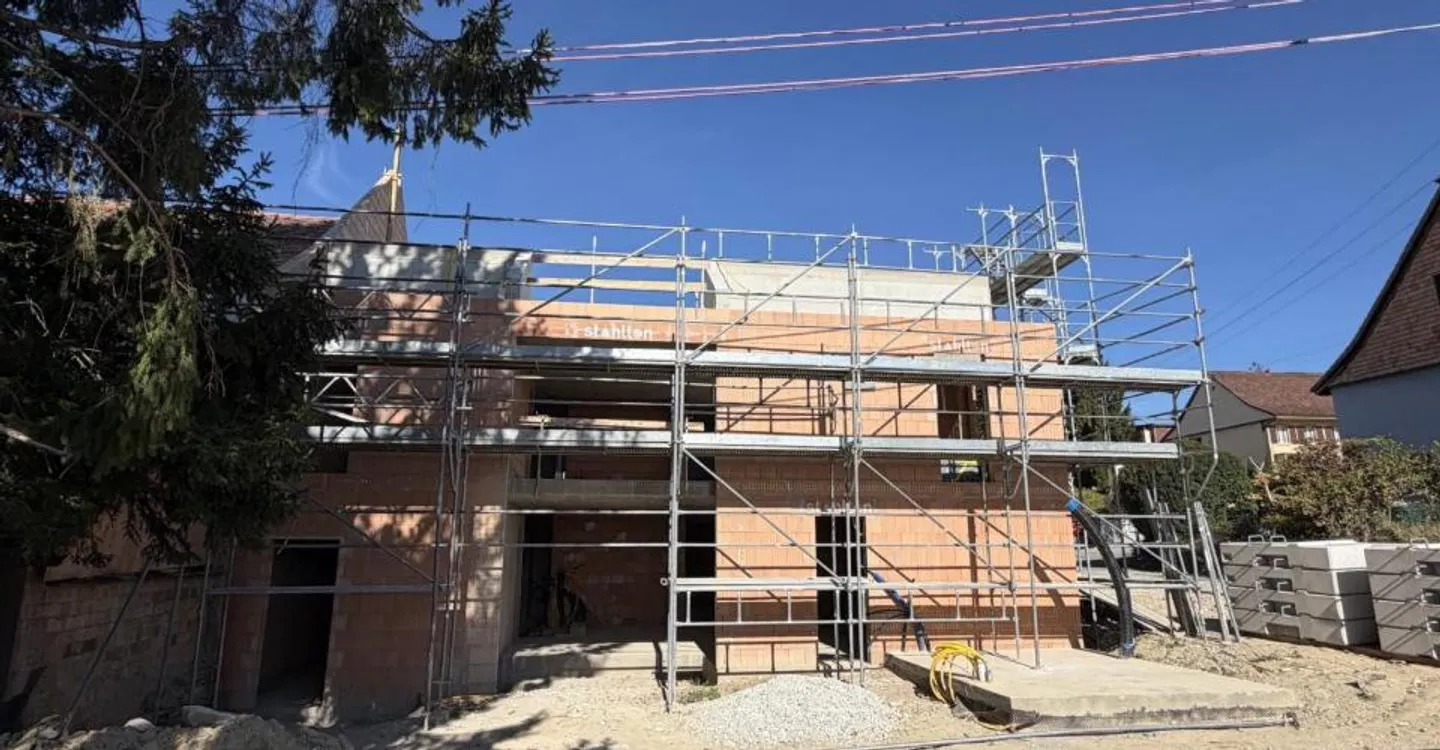 The construction is progressing! Delivery for summer 2027. Only 2 apartments available. Starting from CHF 795,000.--. - Photo 2 of 12