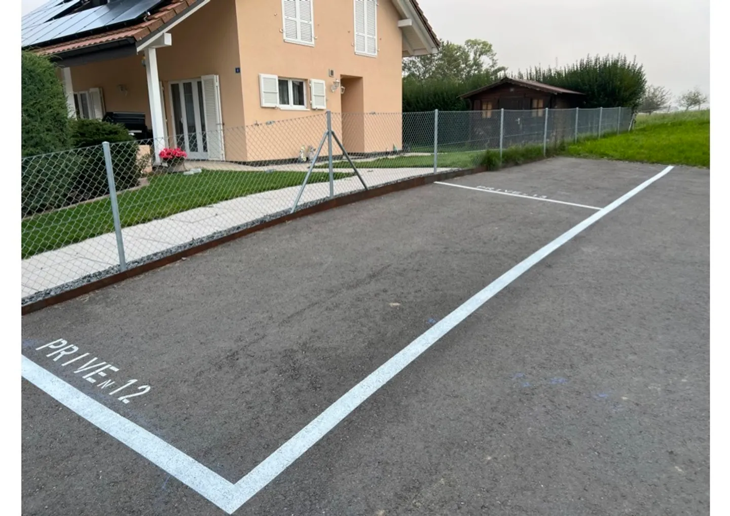 Place de parc extérieure à Villaz-St-Pierre - Photo 2 sur 2