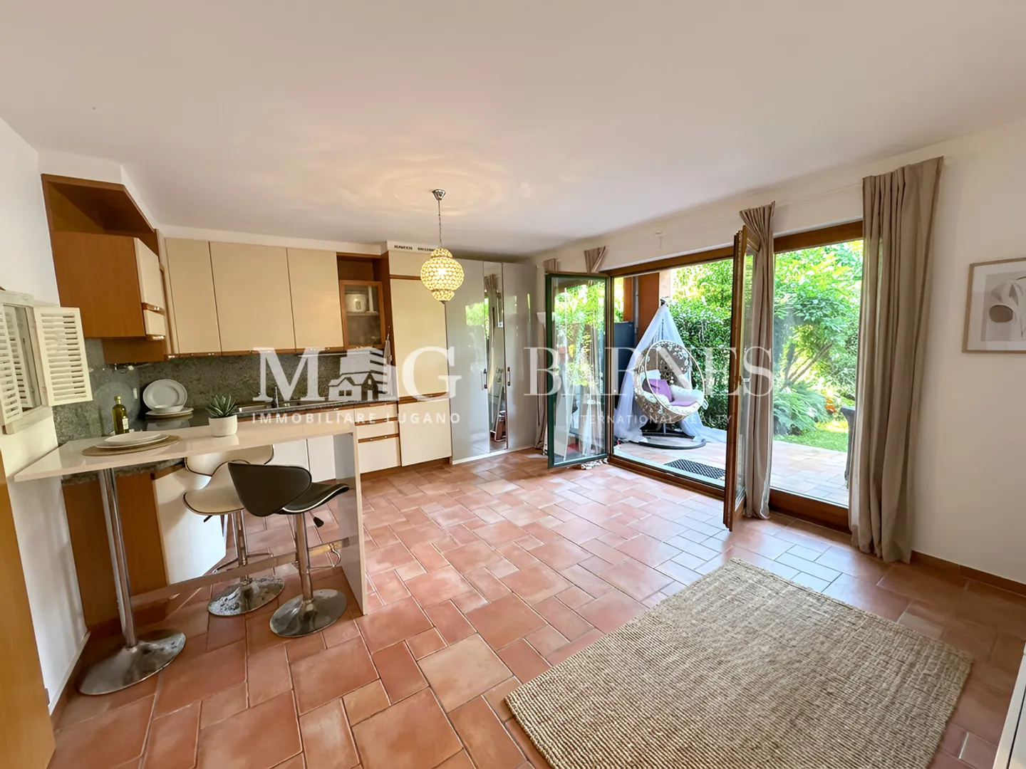 Charmant Appartement avec Jardin à Collina d'Oro - Photo 1 sur 7