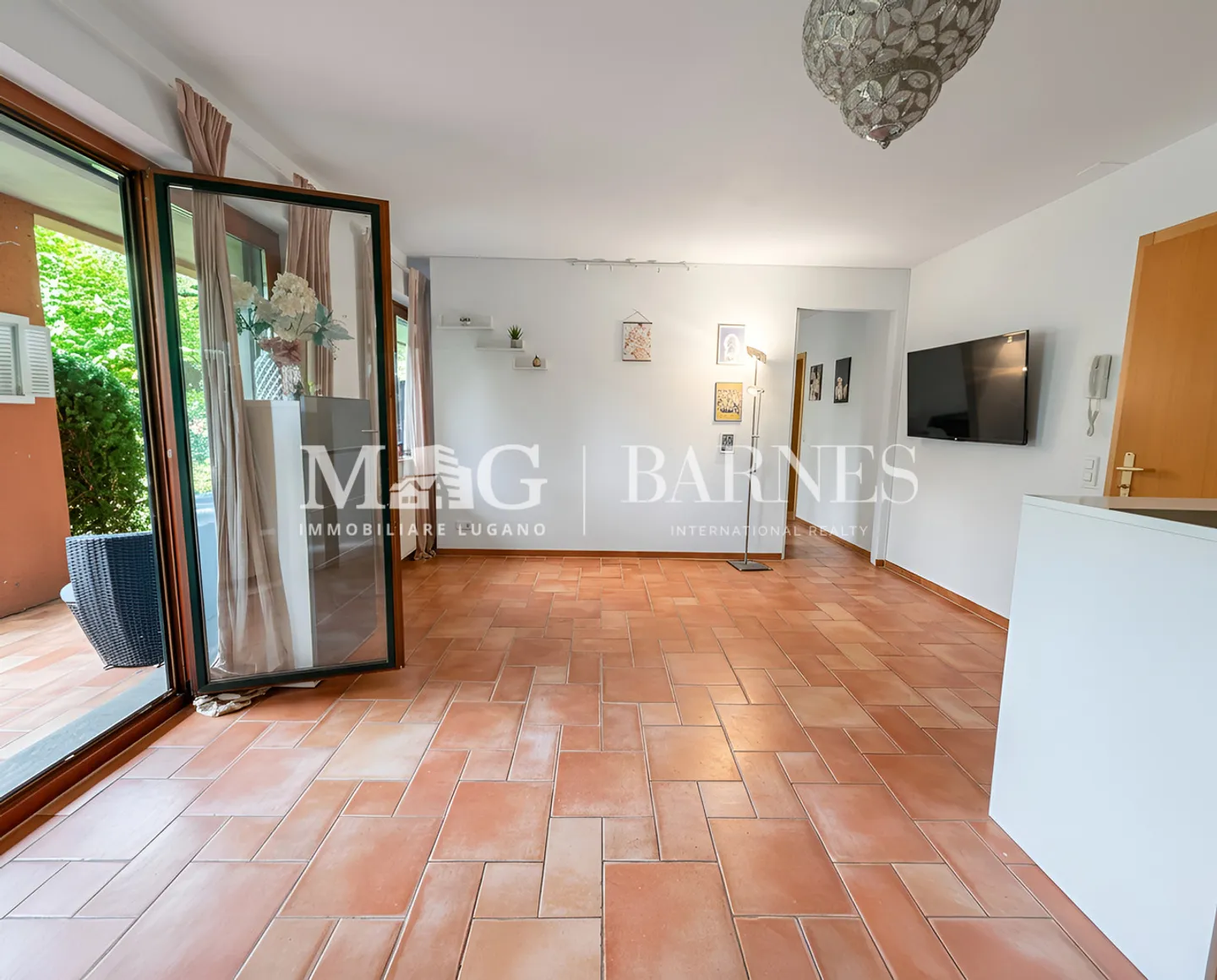 Charmant Appartement avec Jardin à Collina d'Oro - Photo 7 sur 7