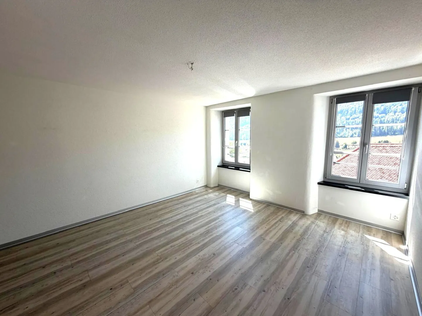 Charmante Wohnung in St-Imier - Foto 7 von 8
