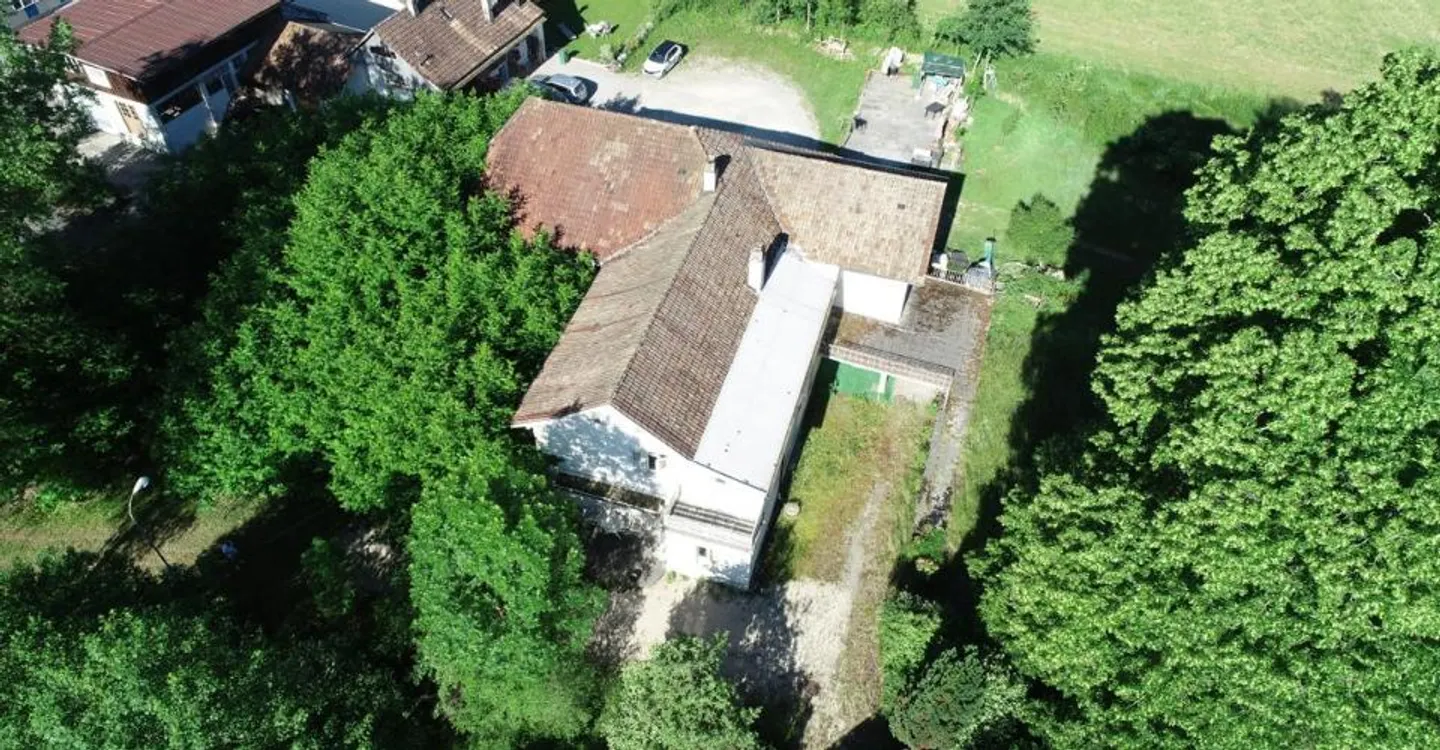 Charaktereigenschaft mit 3 Wohnungen und Baugrundstück in Perrefitte - Foto 1 von 11