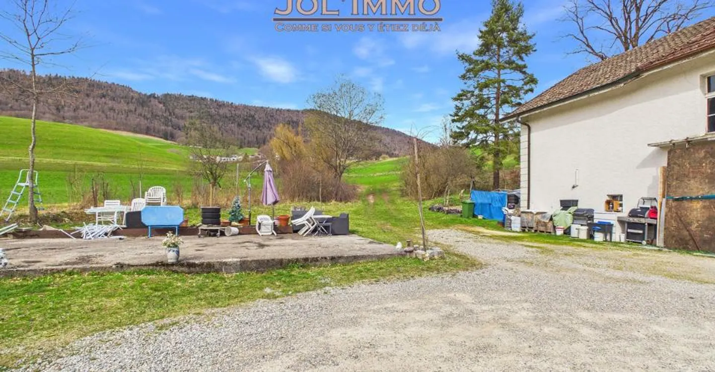 Charaktereigenschaft mit 3 Wohnungen und Baugrundstück in Perrefitte - Foto 6 von 11