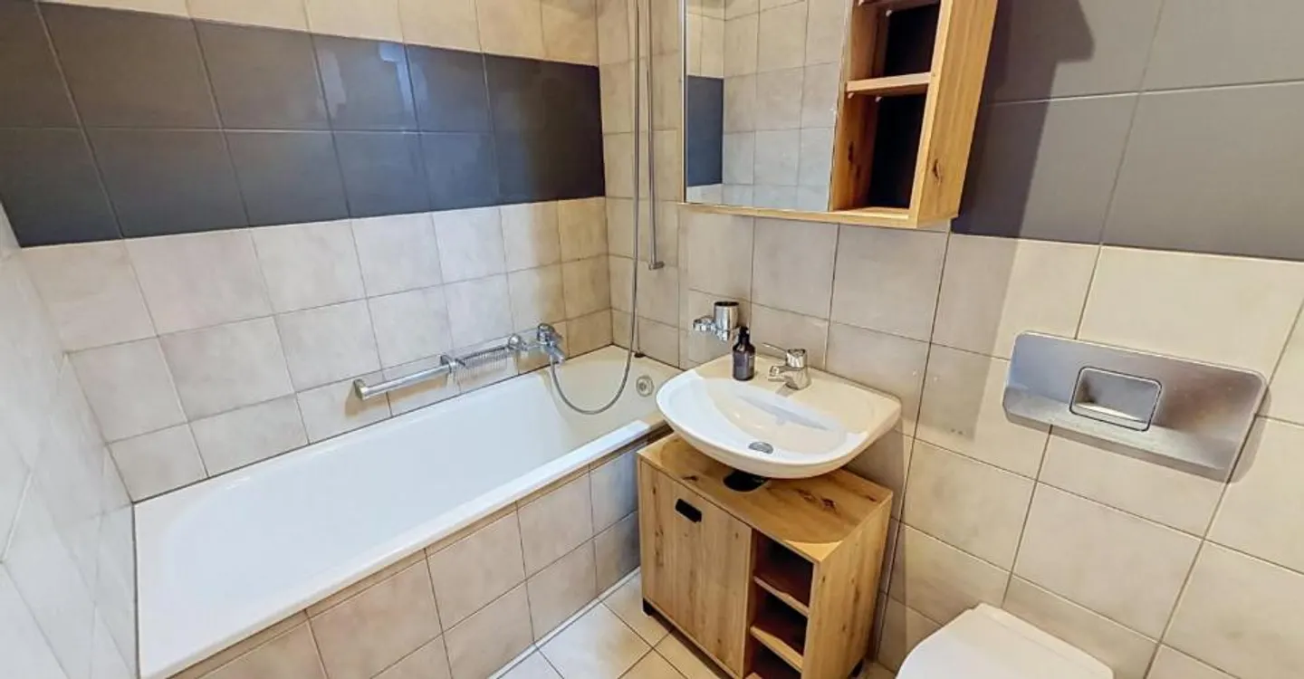 Appartamento di 2,5 stanze al 1° piano - Foto 7 di 8