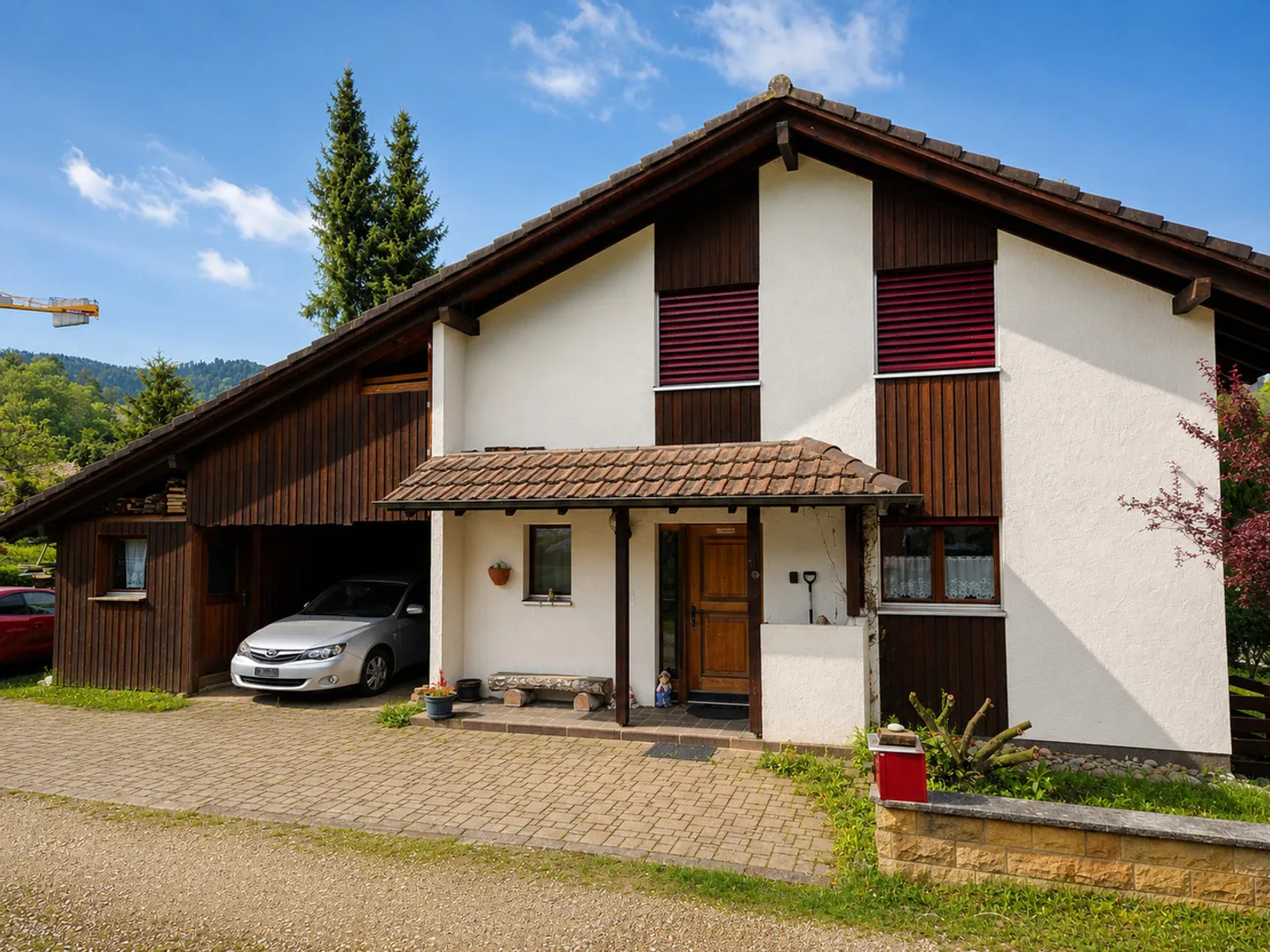 Detached single-family house with attached carport / storage shed - Photo 1 of 9