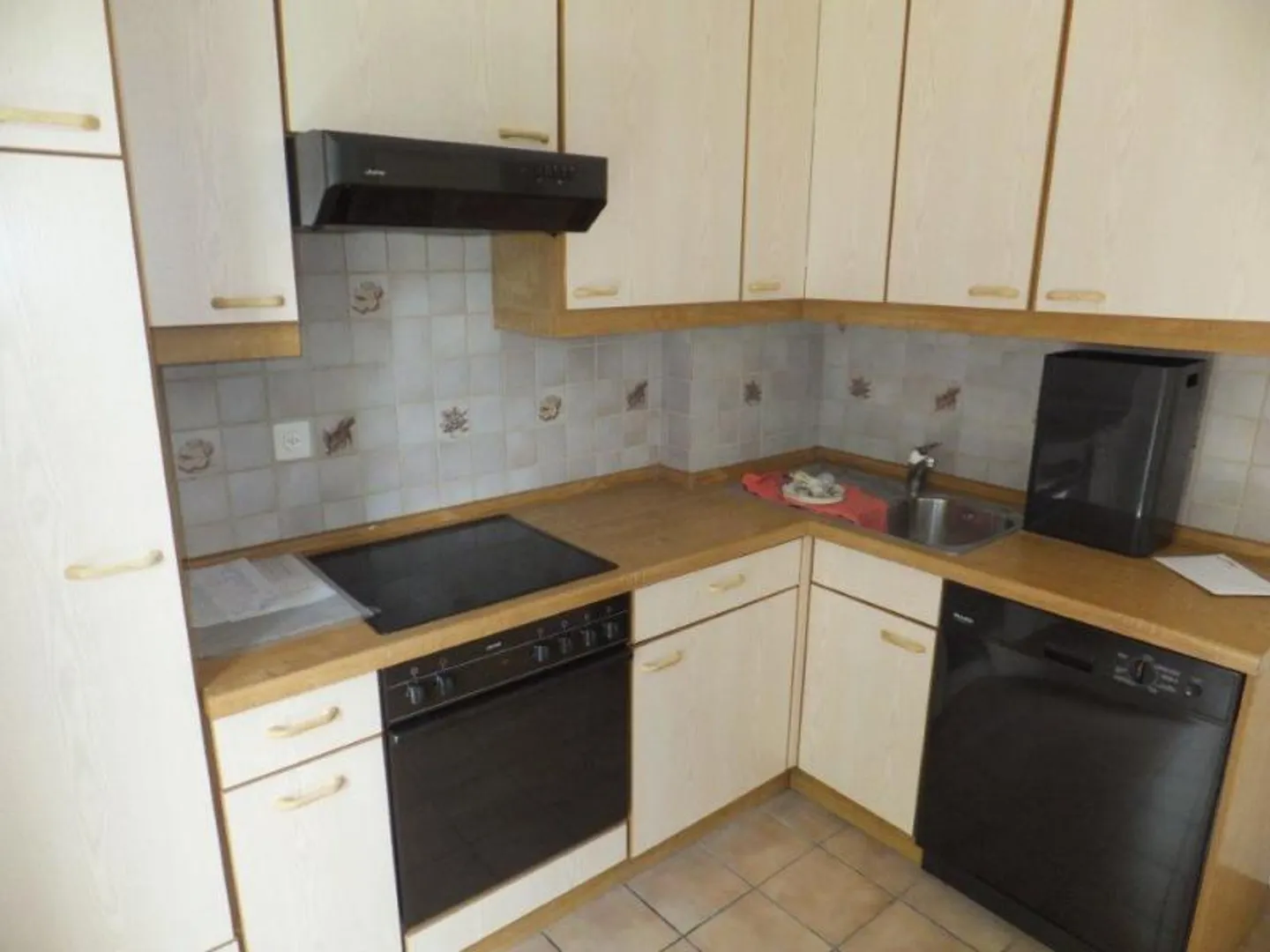 Appartement de 3 pièces au rez-de-chaussée - Photo 2 sur 4