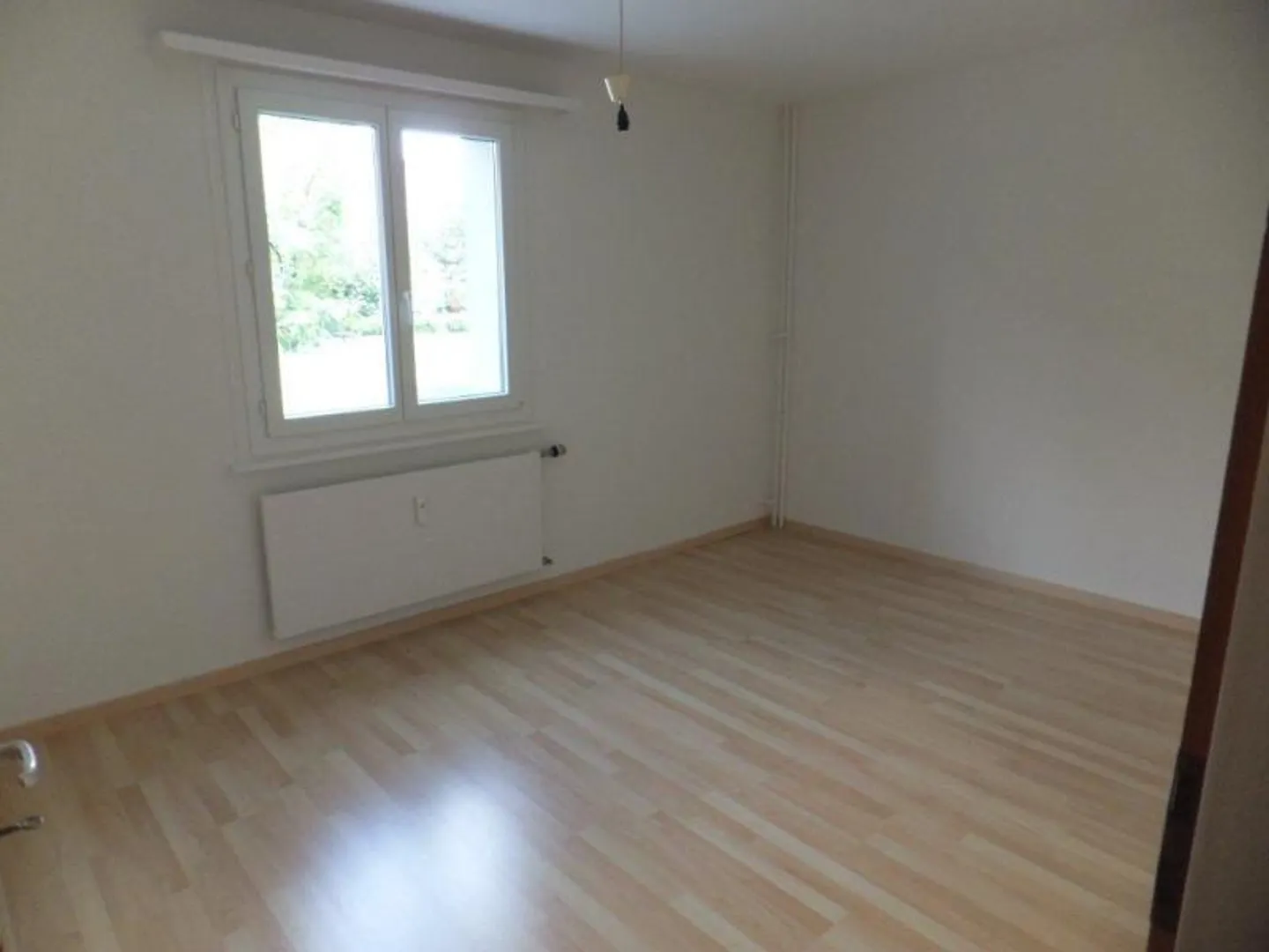 Appartement de 3 pièces au rez-de-chaussée - Photo 3 sur 4