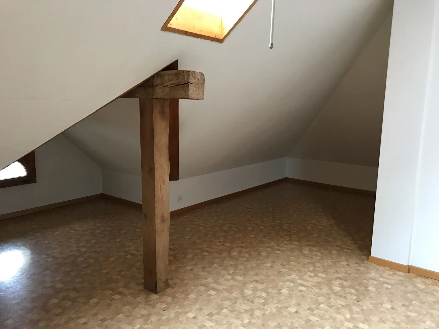 Charmante Dachwohnung - Foto 4 von 7