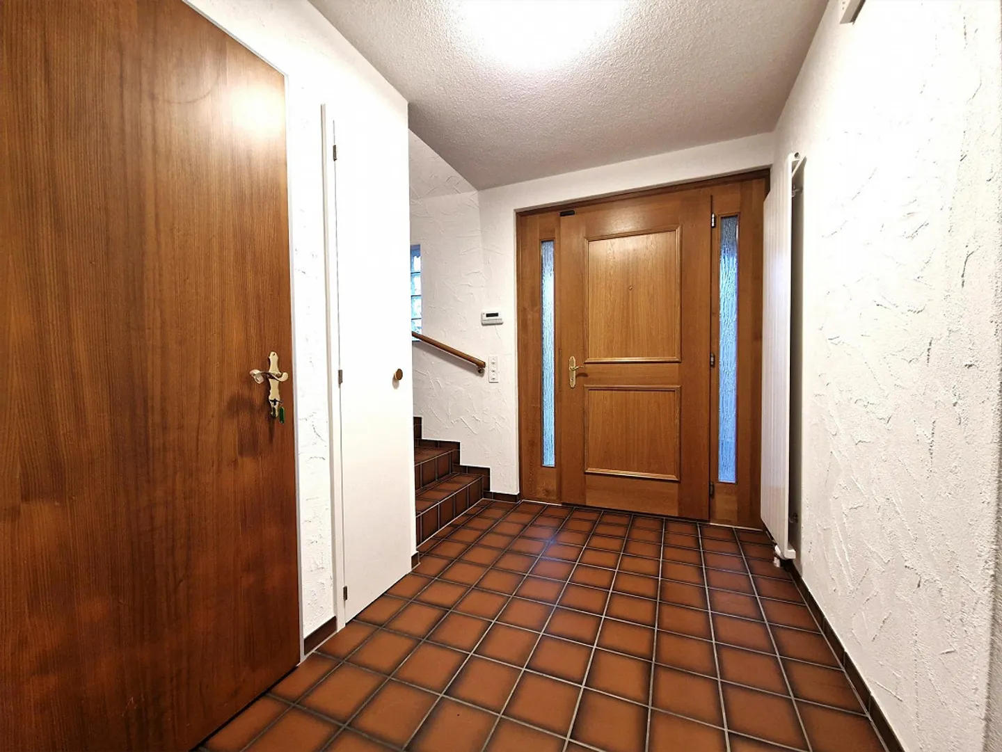 Charmante maison individuelle de 4,5 pièces avec jardin et garage à Eglisau - Photo 2 sur 12