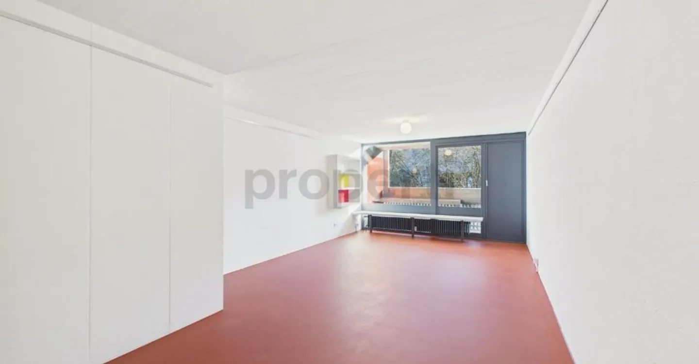 Vivre dans une icône de l'architecture suisse | Appartement unique de 3,5 pièces dans l'ensemble Atelier-5 classé à Flamatt - Photo 1 sur 13