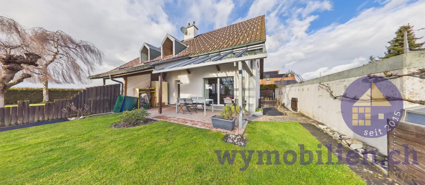 Family Dream in Lyssach: Semi-Detached House with Garden + 2 Garages - Photo 1 of 12