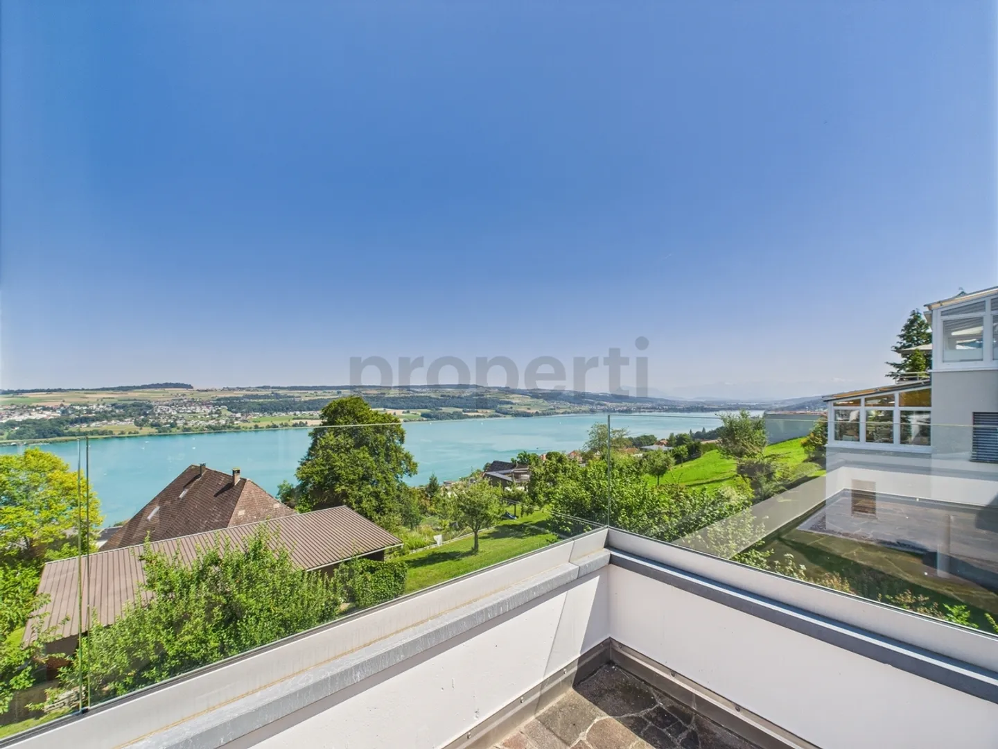 Living where others vacation. Dreamy 5.5 room penthouse apartment in Birrwil for sale with stunning views of the lake and mountains! - Photo 9 of 10