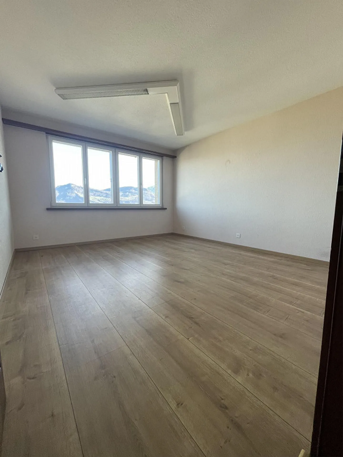 Appartement en duplex de 5,5 pièces avec combles aménagés - Photo 7 sur 15