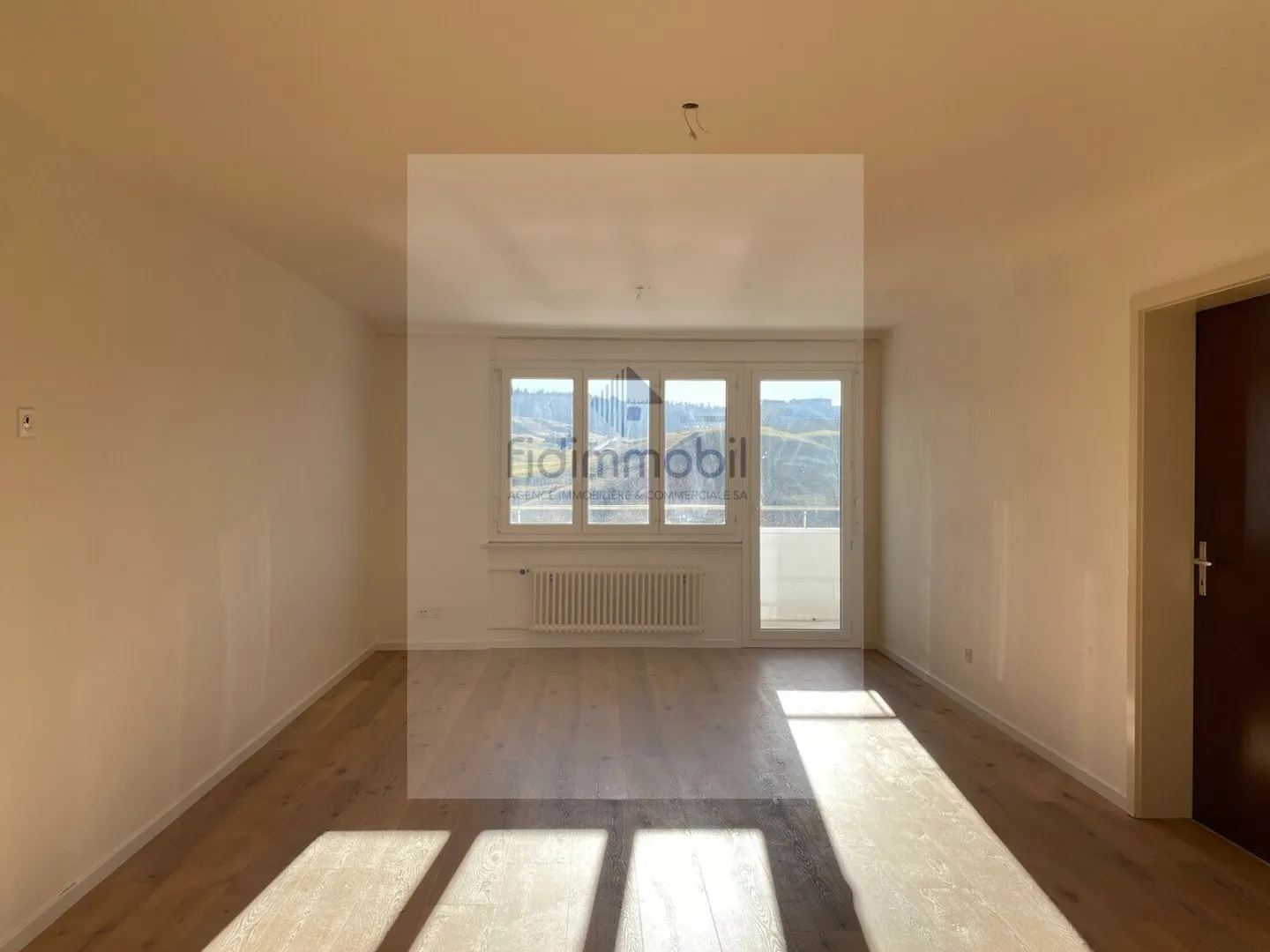 Charmant Appartement 3.5 pièces - Photo 2 sur 9