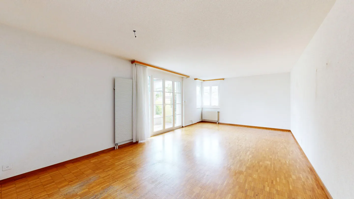 Appartement de jardin 4,5 pièces avec place de parking dans le Jura - Photo 1 sur 11
